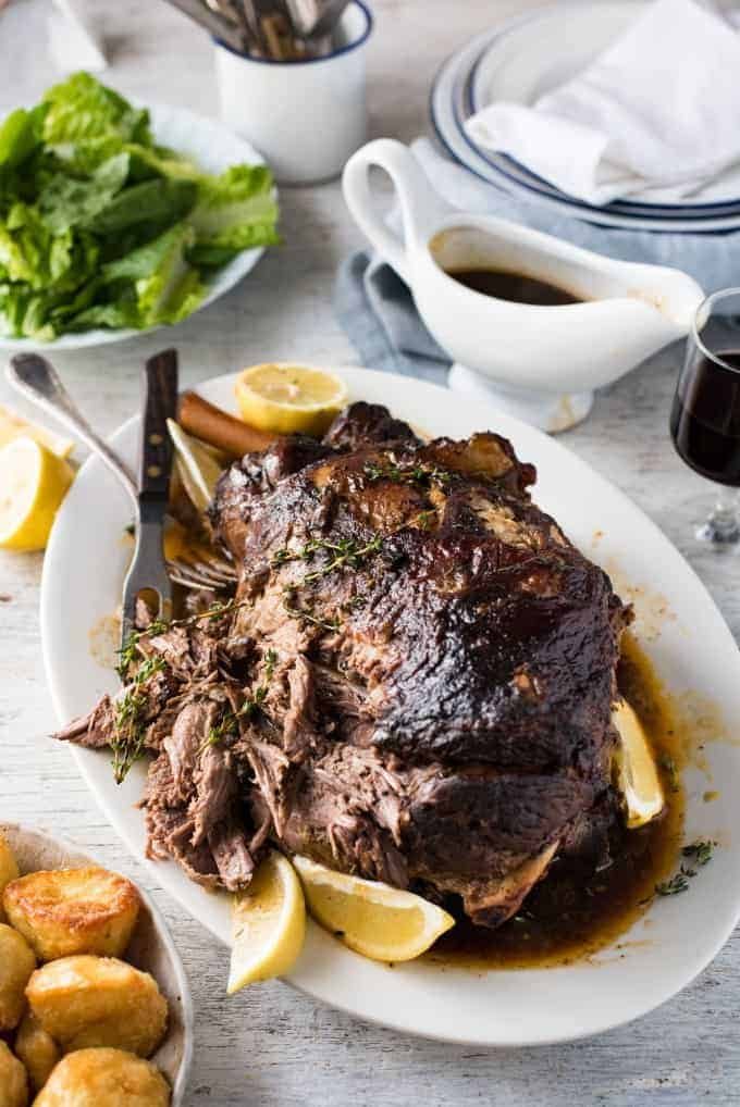 Slow-Roasted Mediterranean Lamb with Herbed Garlic Jus