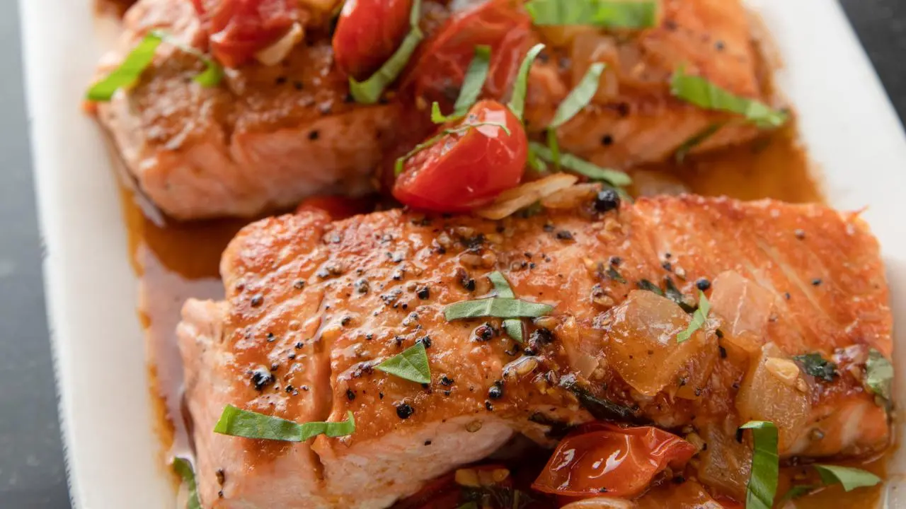 Sautéed Garlic-Ginger Salmon with Zucchini Noodles and Cherry Tomatoes