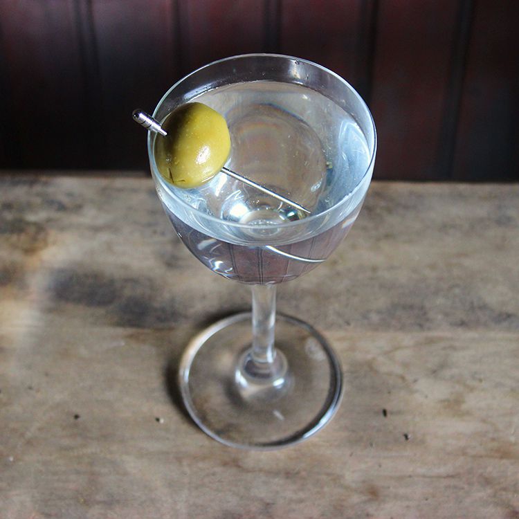 Smoky Absolut Vodka Martini with Olive Garnish