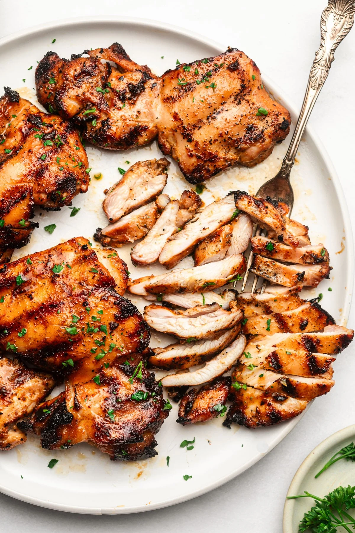 Authentically Marinated Grilled Chicken Thighs with Lemon-Herb Butter