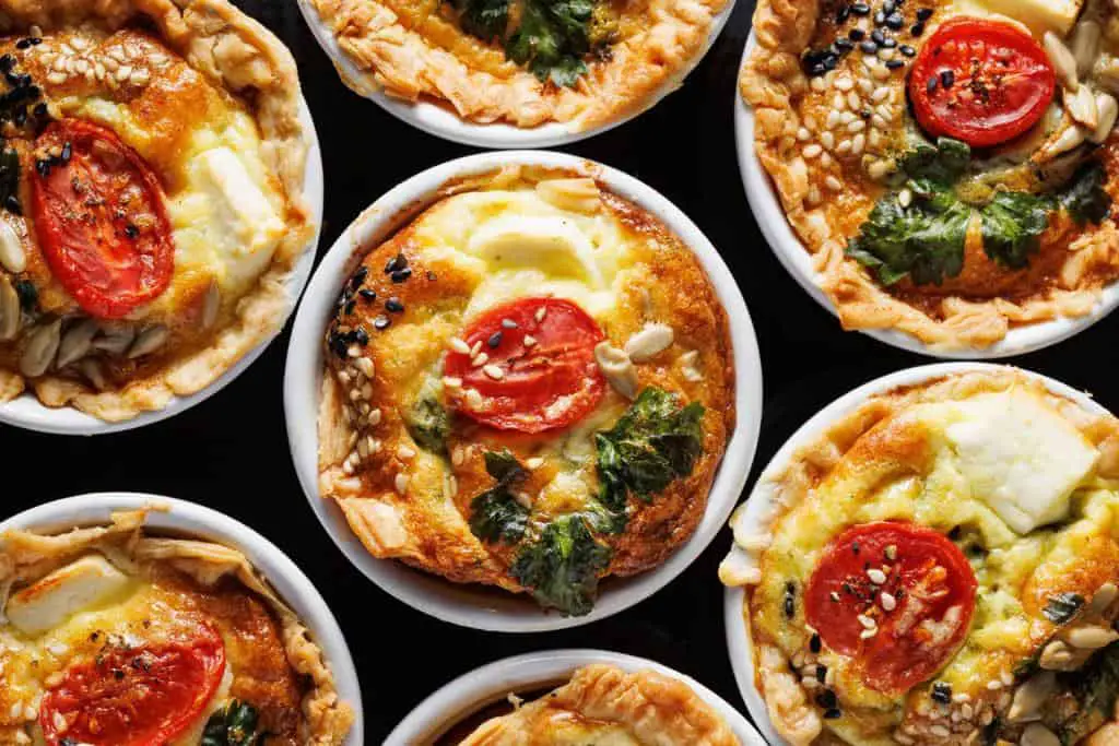 Cheesy Mini Quiches with Spinach and Cherry Tomatoes