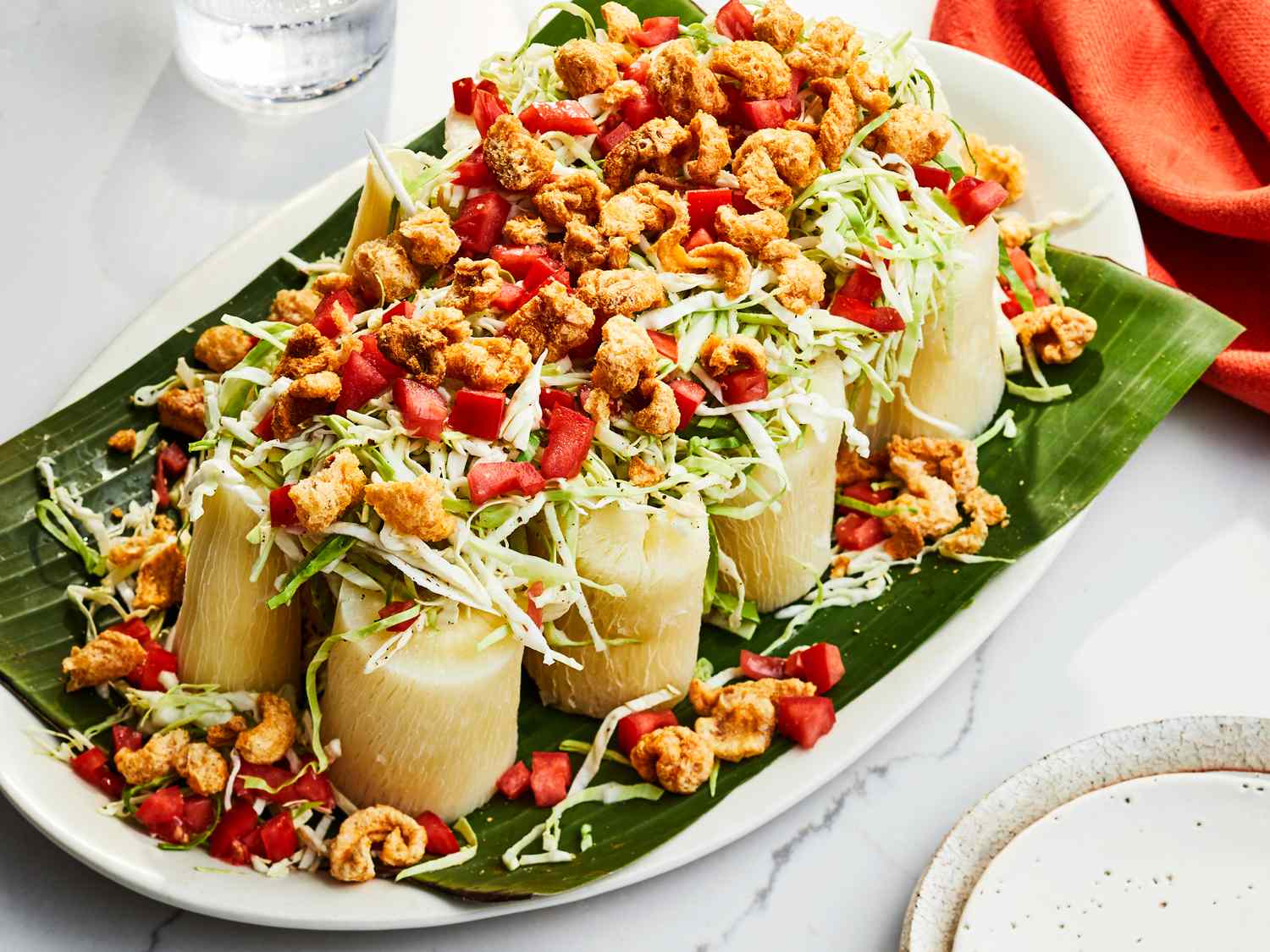 Vigorón with Boiled Yuca, Crispy Chicharrón and Tangy Cabbage Slaw