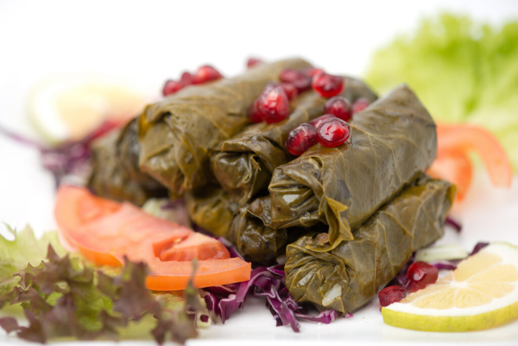 Yalanji Stuffed Grape Leaves with Tomato, Mint and Pomegranate Molasses