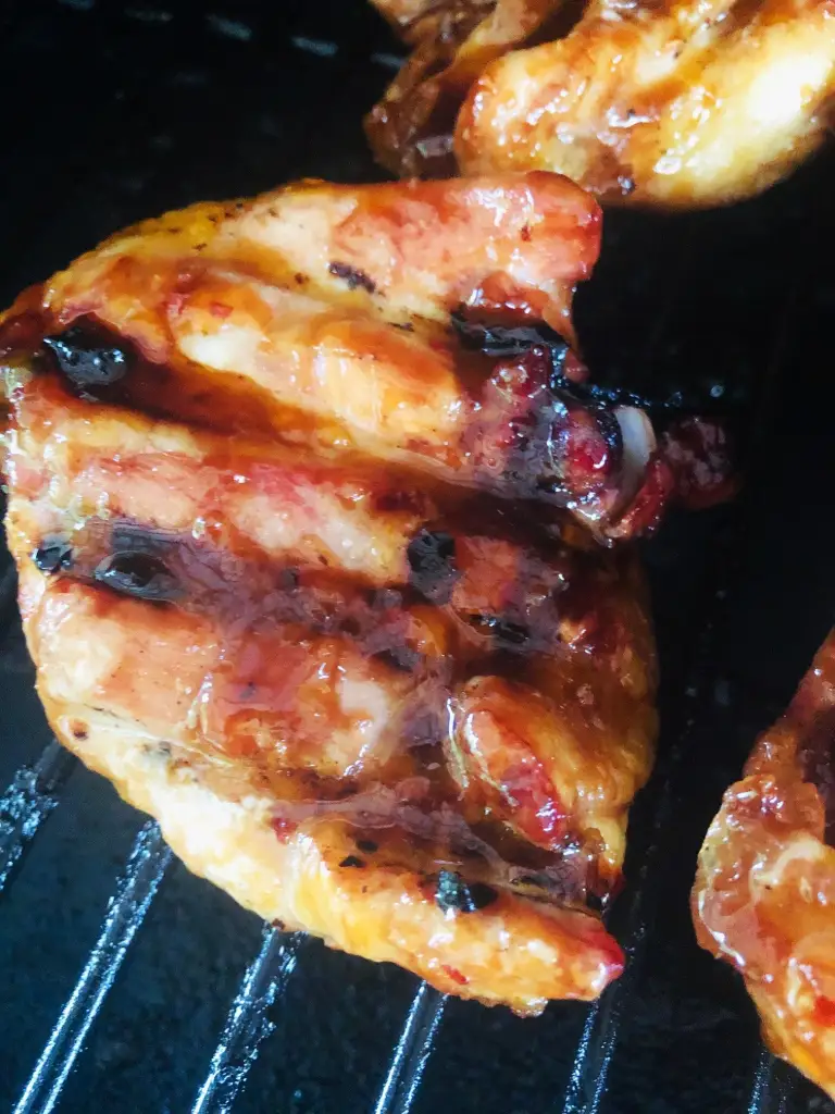 Smoked Peach Chicken Thighs with Bourbon Glaze