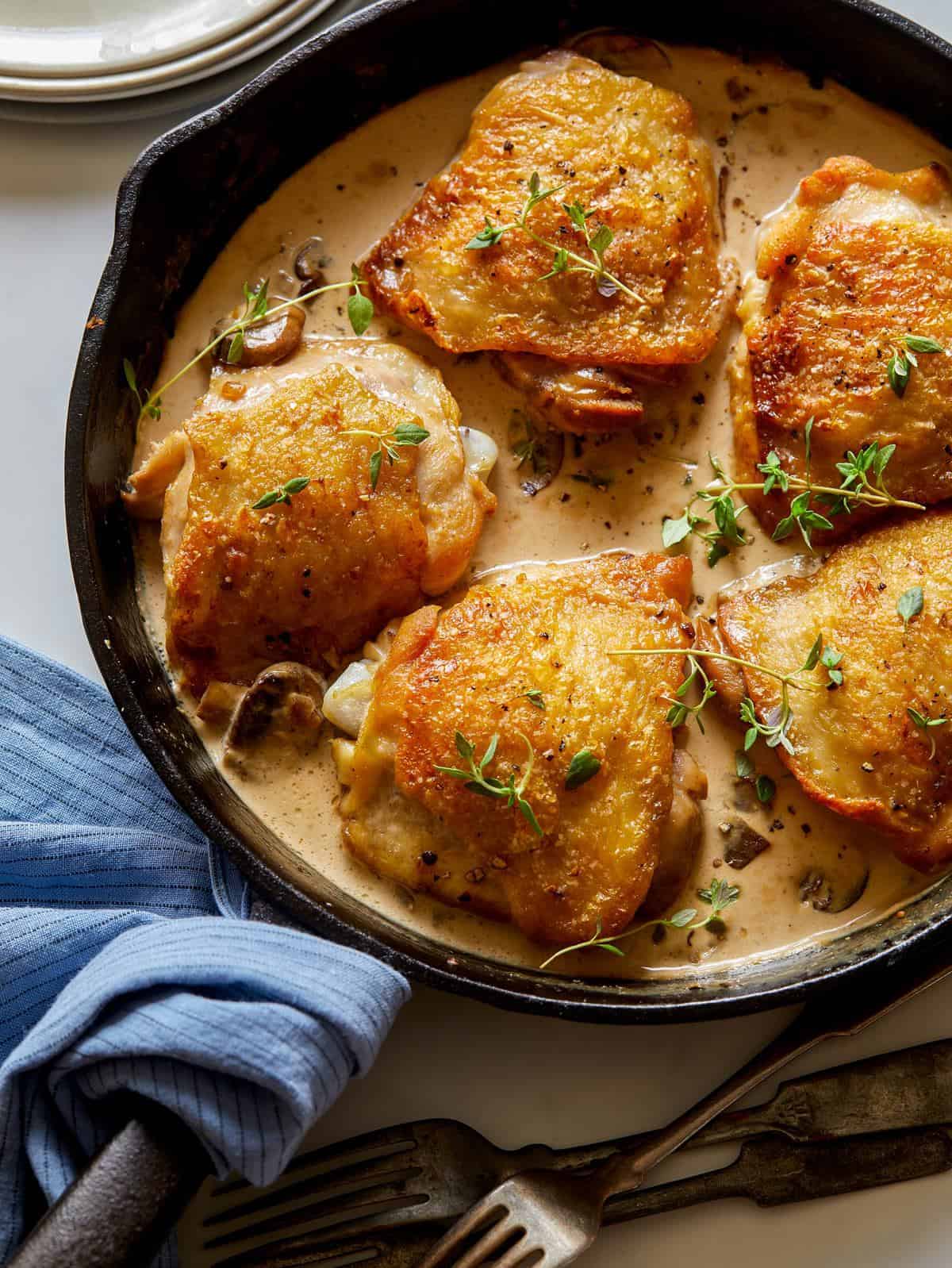 Crispy Skin-On Chicken Thighs with Avocado-Cream Sauce