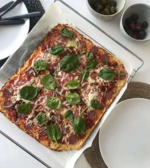 Crispy Keto Cauliflower Pizza with Herbed Tomato Sauce