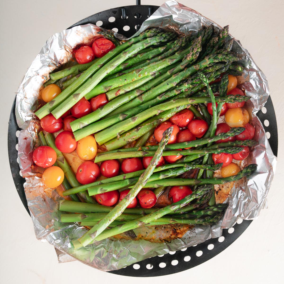 Garlic-Herb Steak with Asparagus and Cherry Tomatoes