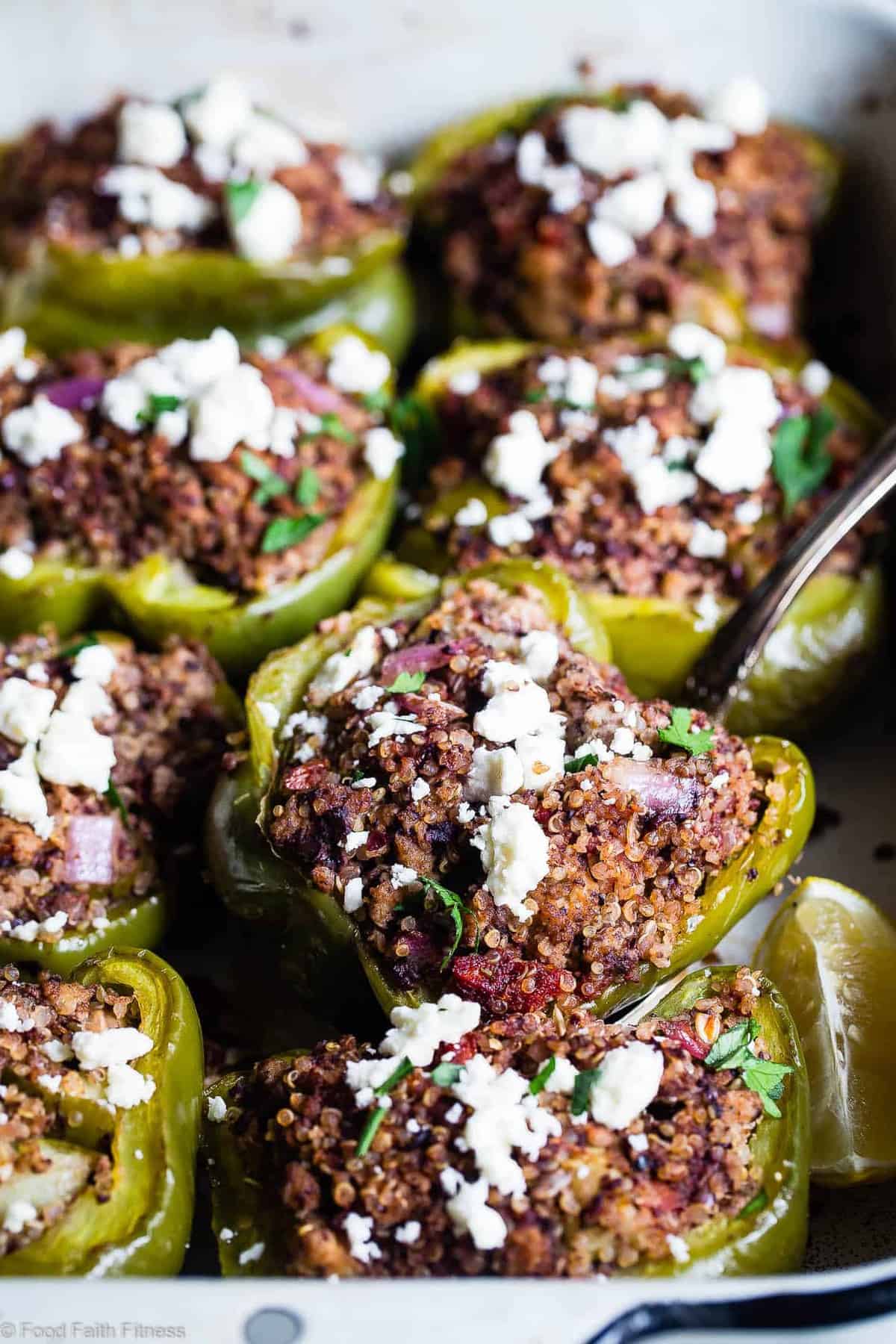 Turkey & Quinoa Stuffed Bell Peppers with Tomato Basil Sauce
