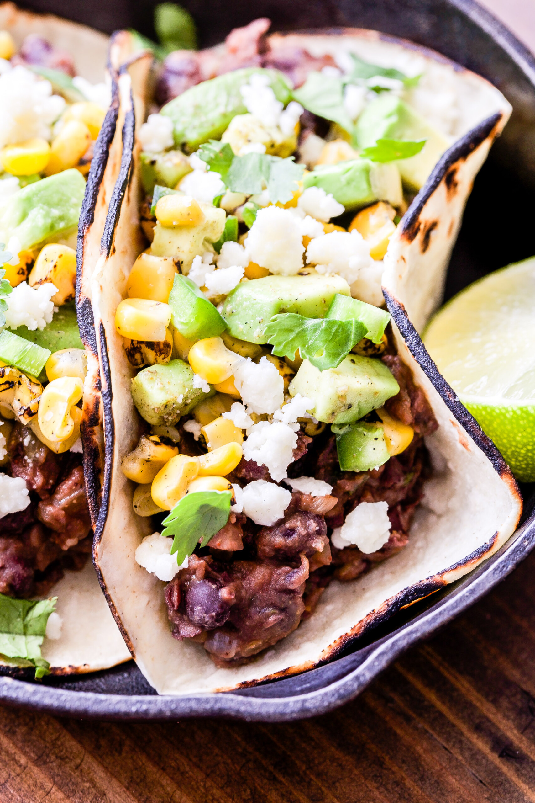 Crispy Black Bean and Corn Tacos with Avocado Crema