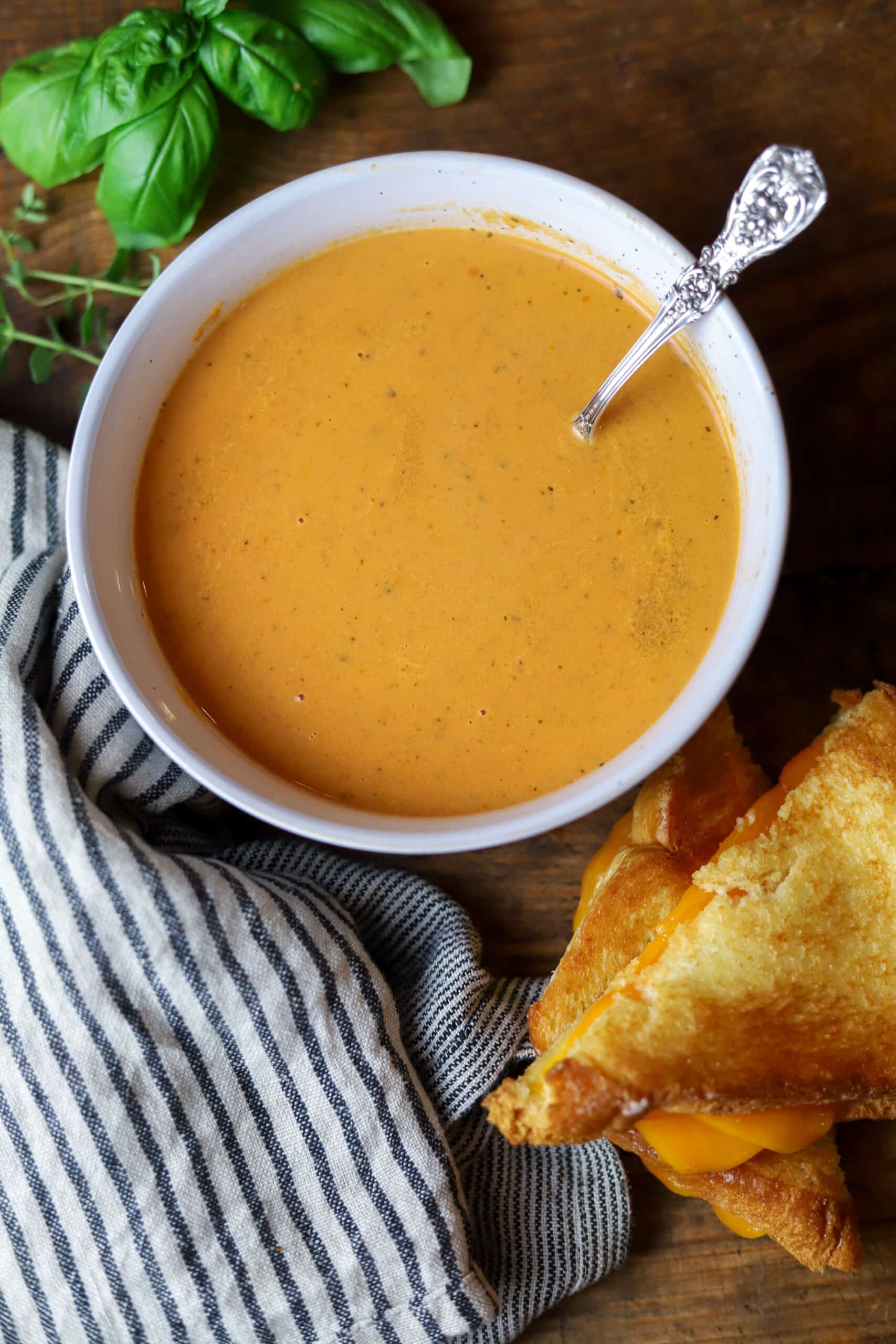 Cancer's Comforting Embrace: Creamy Tomato Basil Soup with Garlic Bread