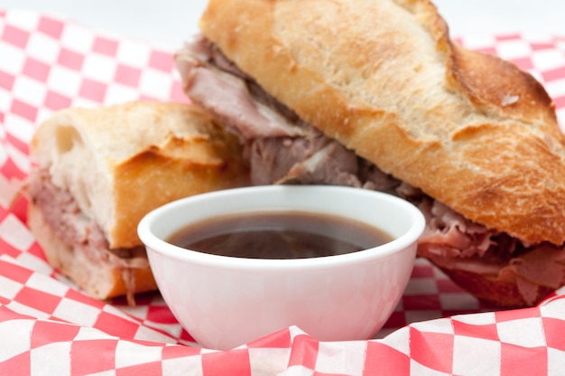 Caramelized Onion Ribeye French Dip Sandwich with Beef Jus