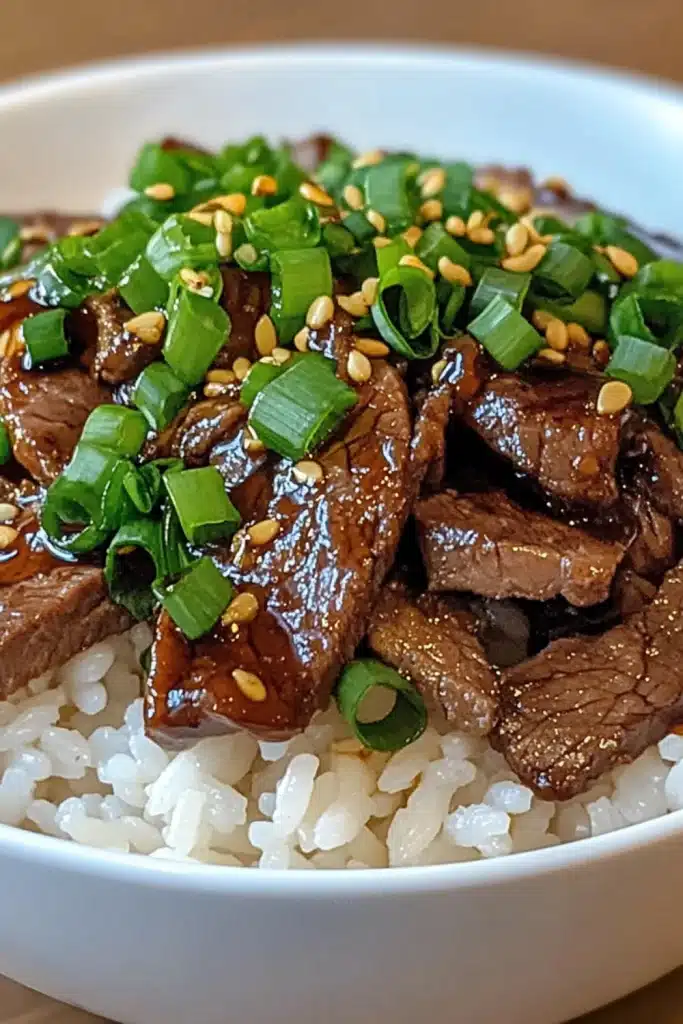 Tender Beef and Onion Rice Bowl with Ginger Glaze