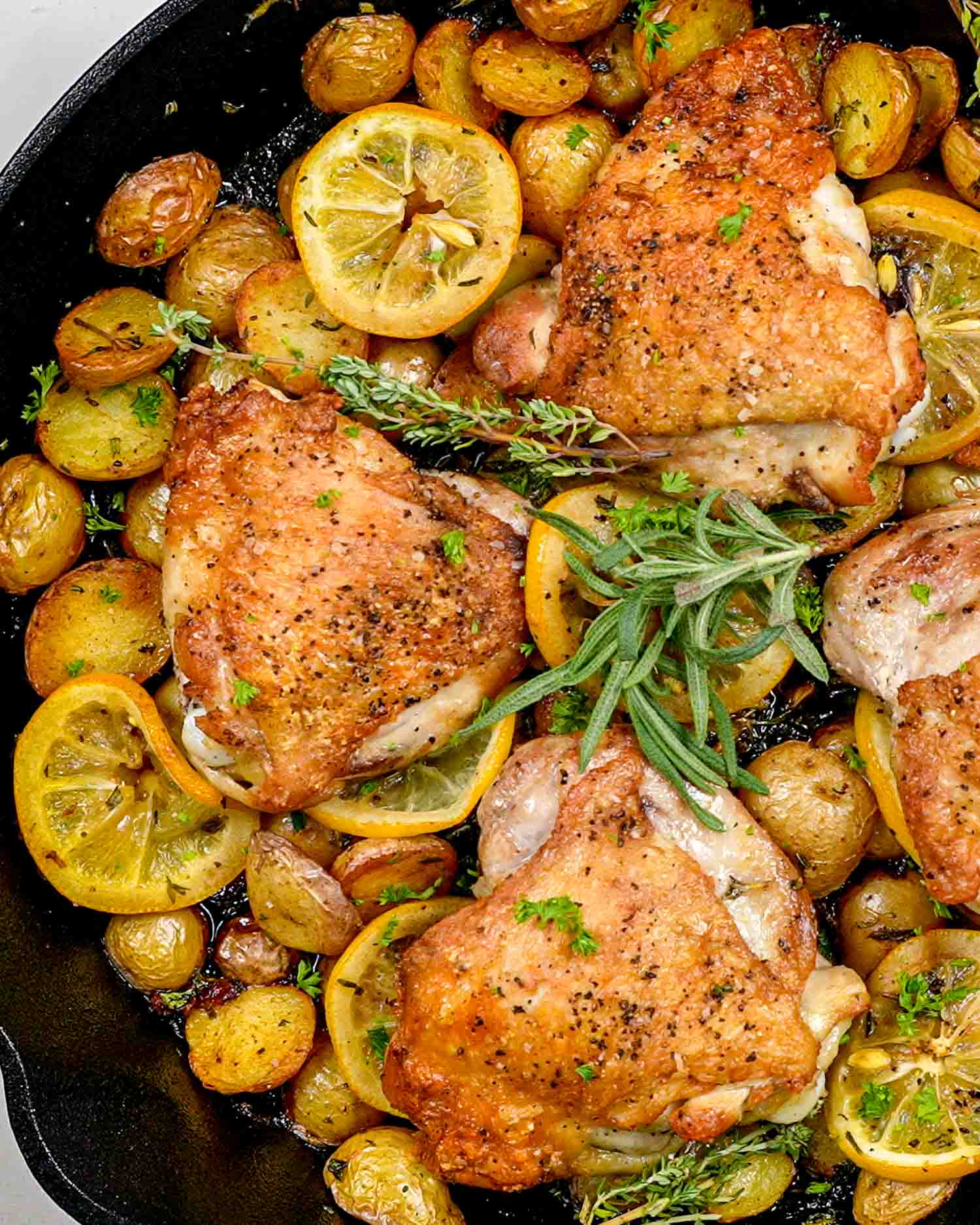 Crispy Rosemary Garlic Chicken with Lemon-Herb Roasted Potatoes