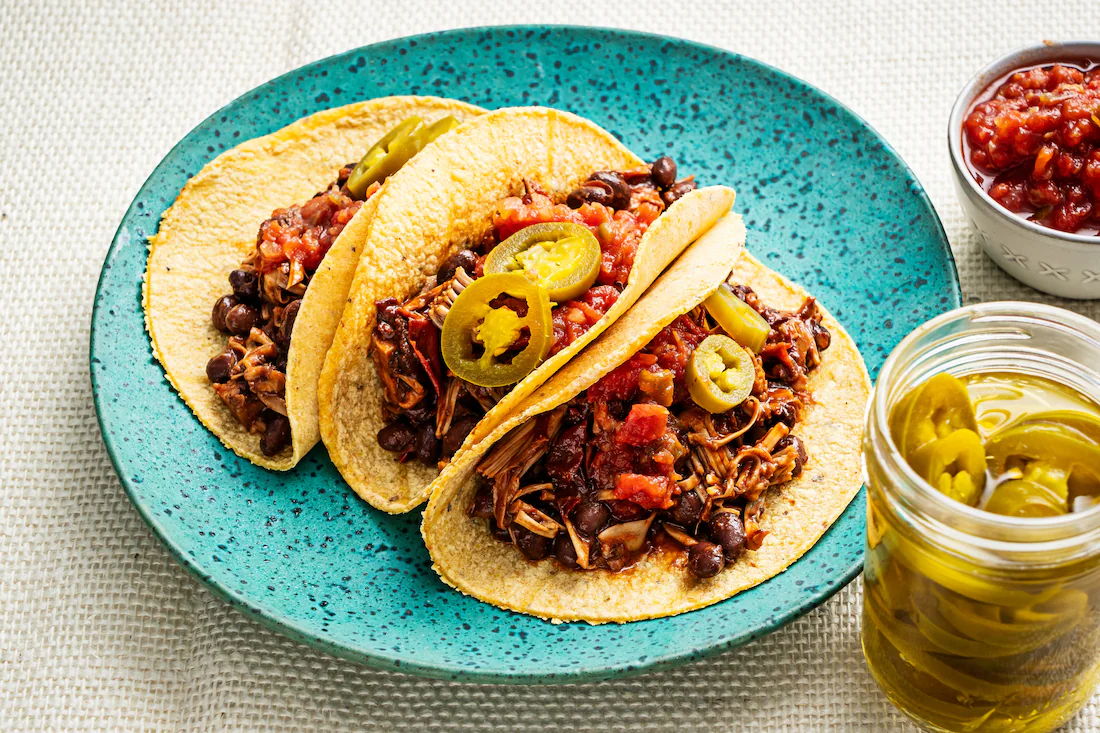 Mexican Jackfruit and Black Bean Tacos with Avocado Crema