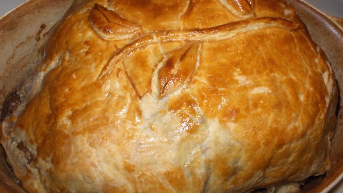 Herb-Crusted Beef Wellington with Truffle