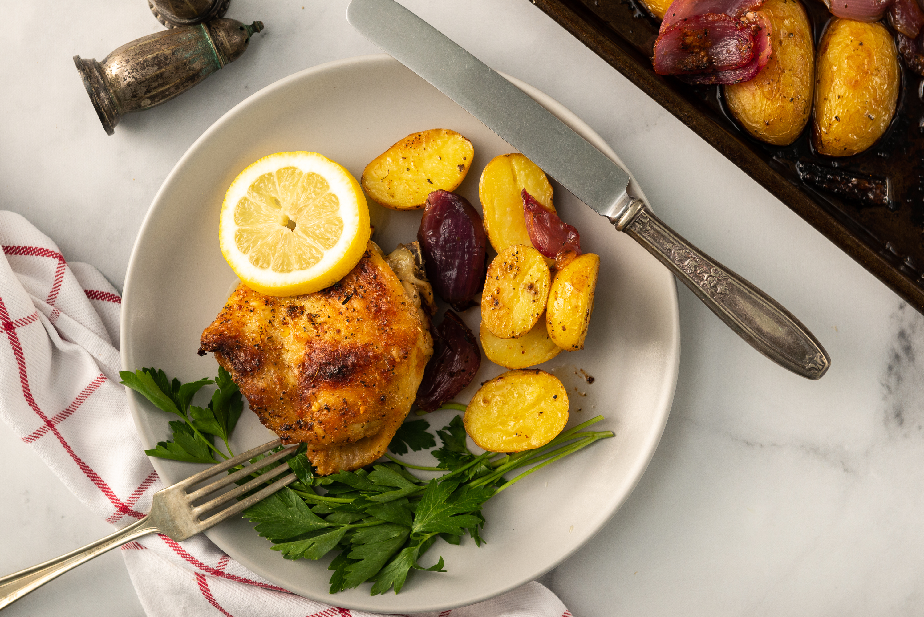 Lemon-Herb Chicken with Garlic-Roasted Potatoes