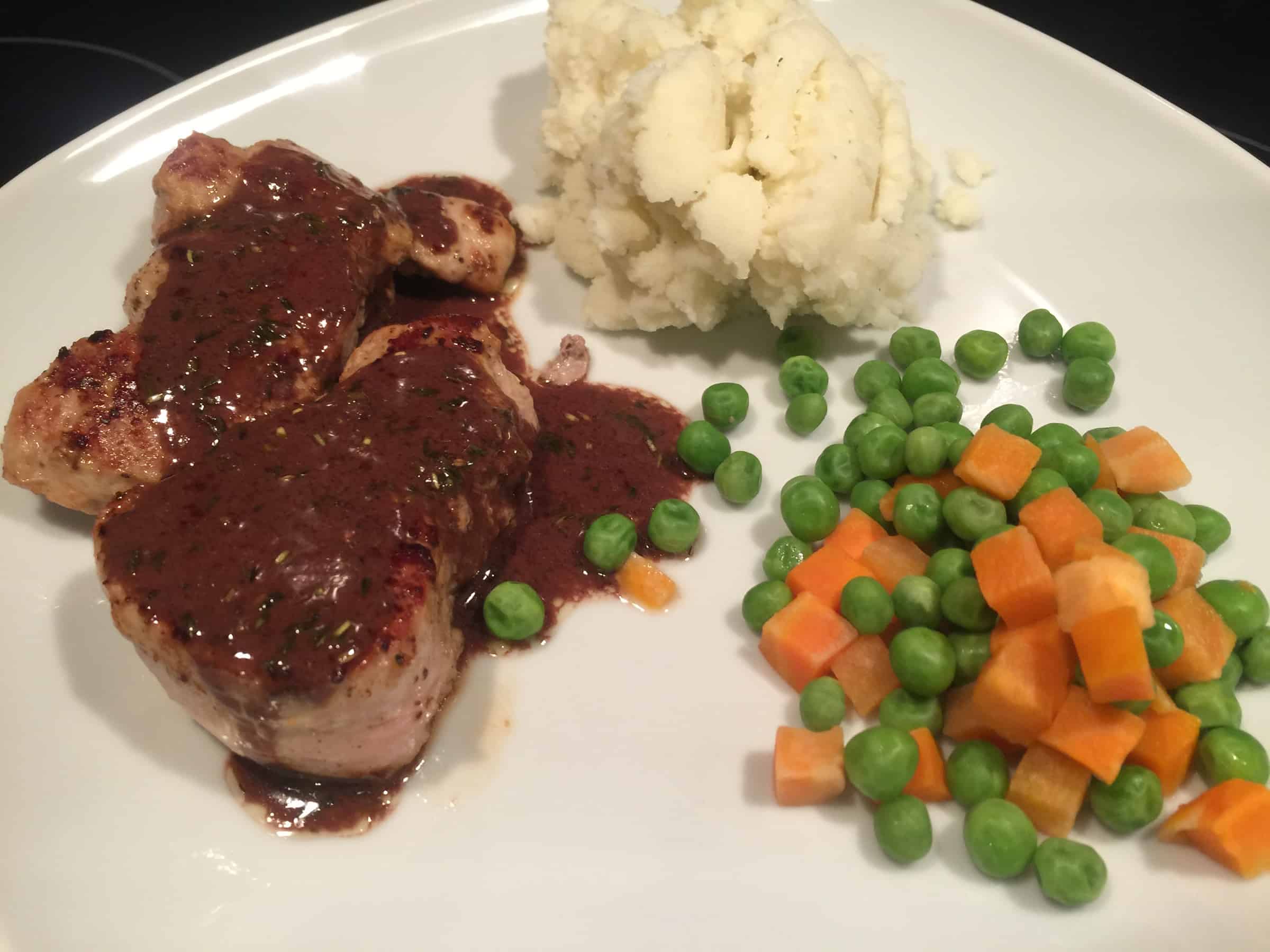 Basin & Marot Herb-Crusted Pork Tenderloin with Wine Glaze