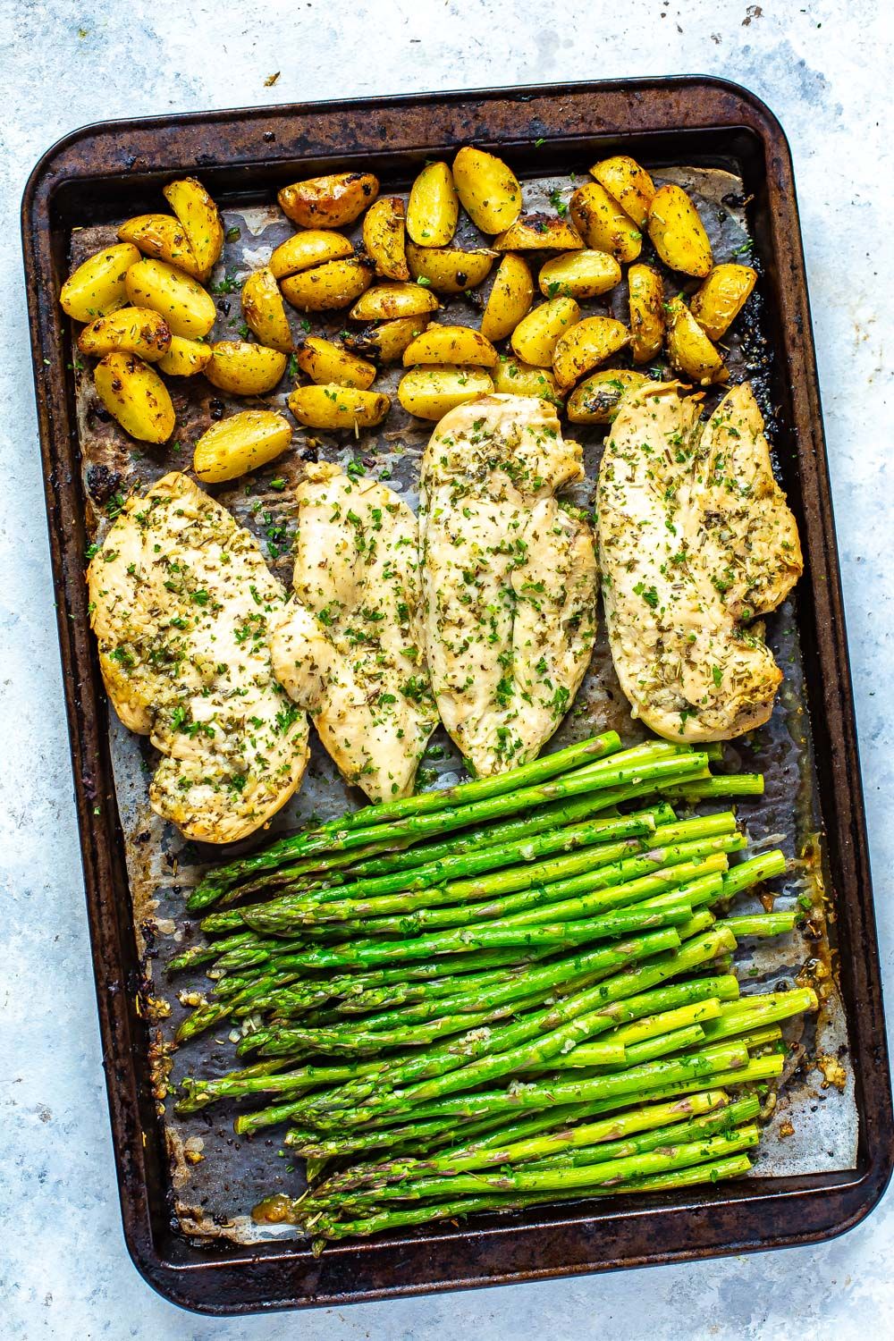 Sheet-Pan Lemon-Herb Chicken with Asparagus and Baby Potatoes