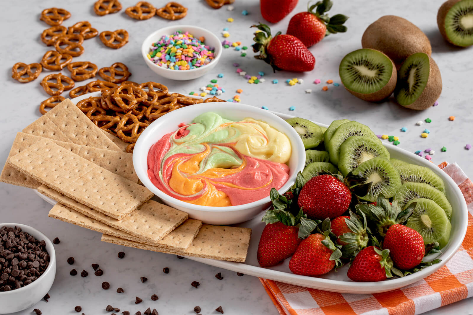 Rainbow Cheesecake Bites with Citrus Dip