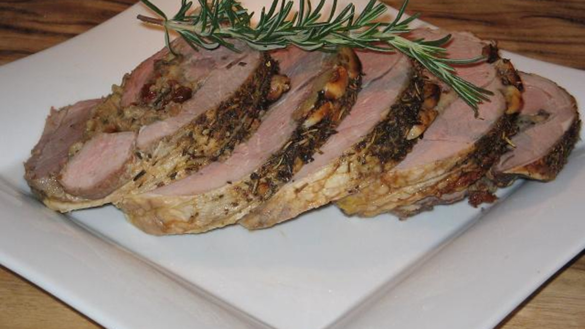 Slow-Roasted Herb-Crusted Lamb Leg with Sun-Dried Tomato