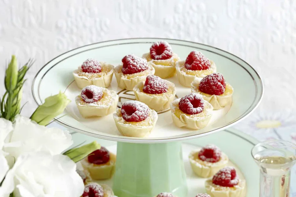 Joyful Lemon Curd Tartlets with Raspberry Swirl