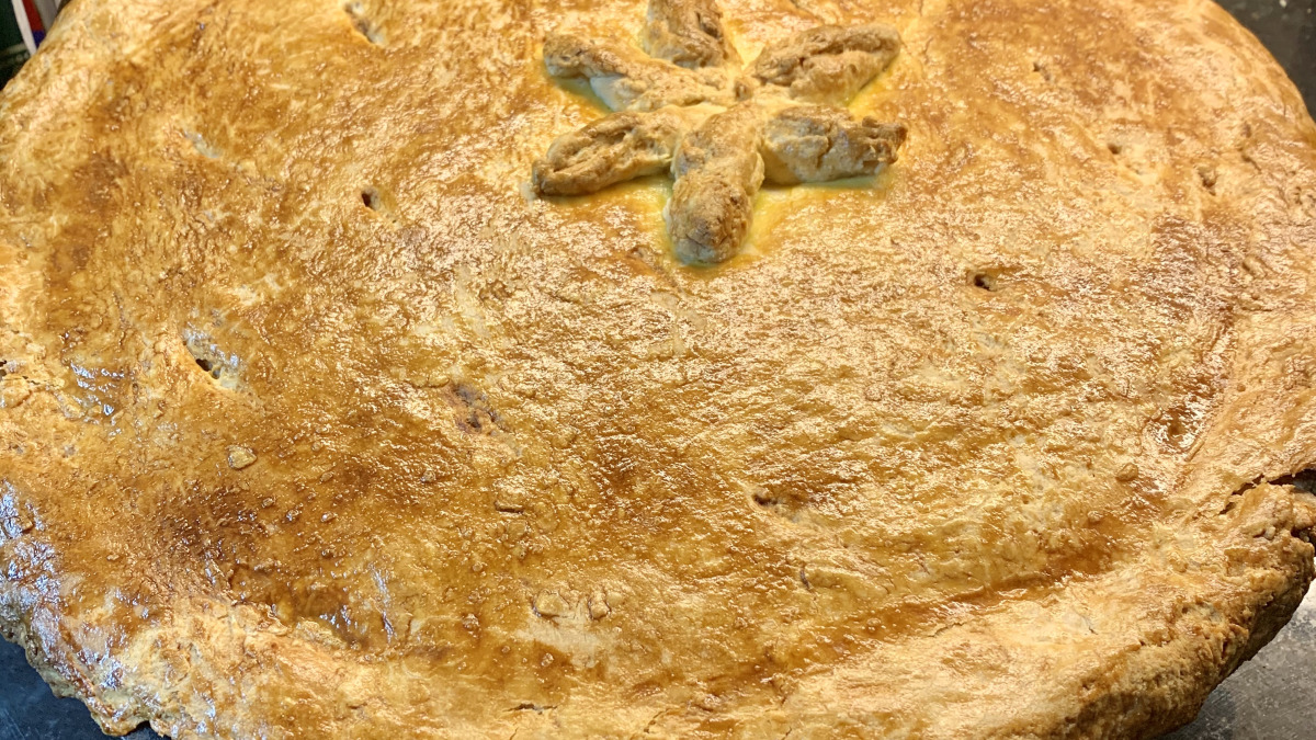 Herb-Infused Chicken Pot Pie with Buttery Biscuit Crust