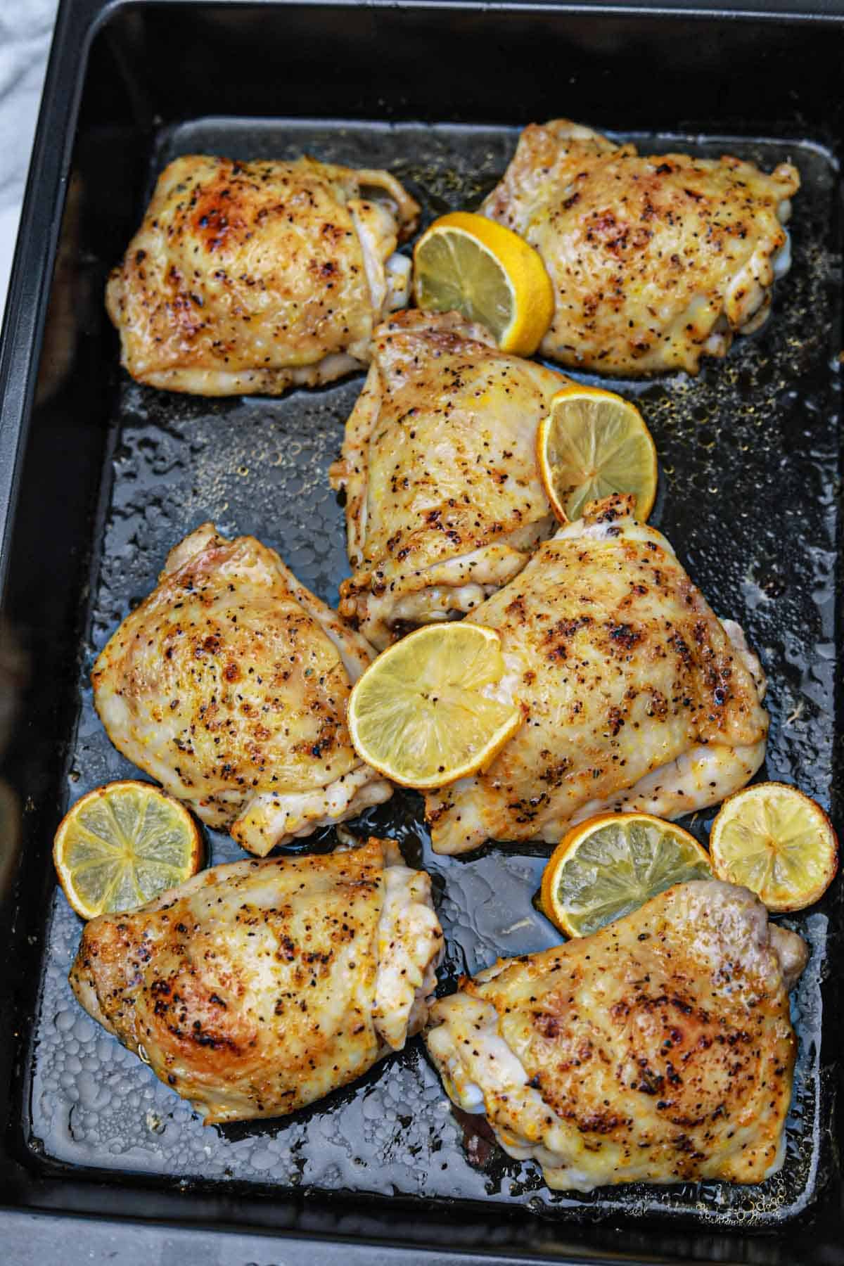 Lemon-Herb Baked Chicken Thighs with Roasted Sweet Potatoes