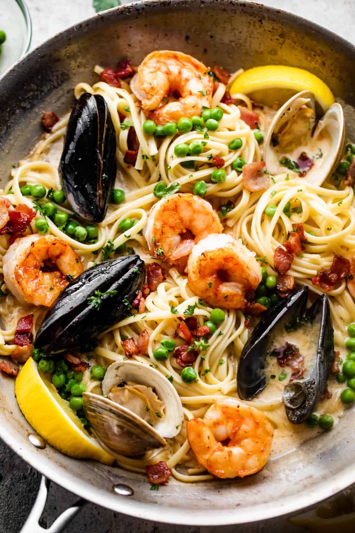 Lemon-Garlic Seafood Pasta with Cherry Tomatoes and Pesto