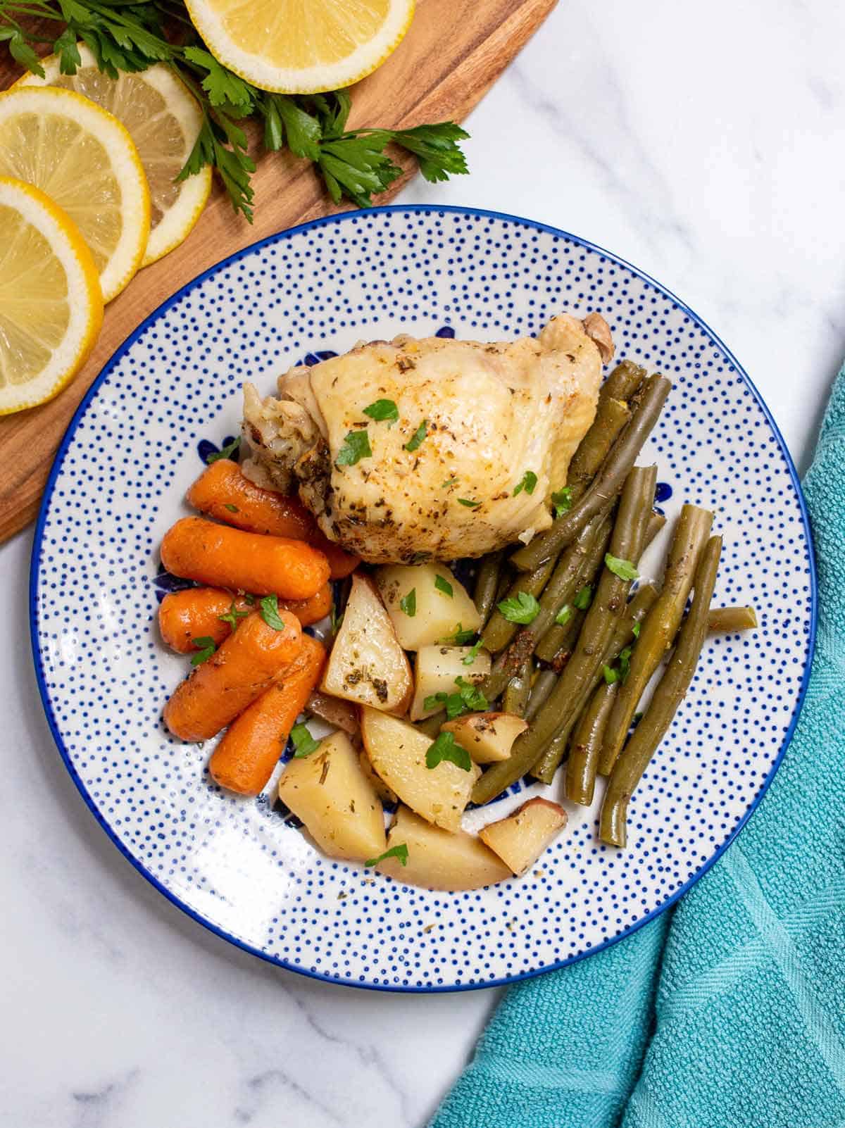 Herb-Infused Slow-Cooker Chicken Thighs with Roasted Veggies
