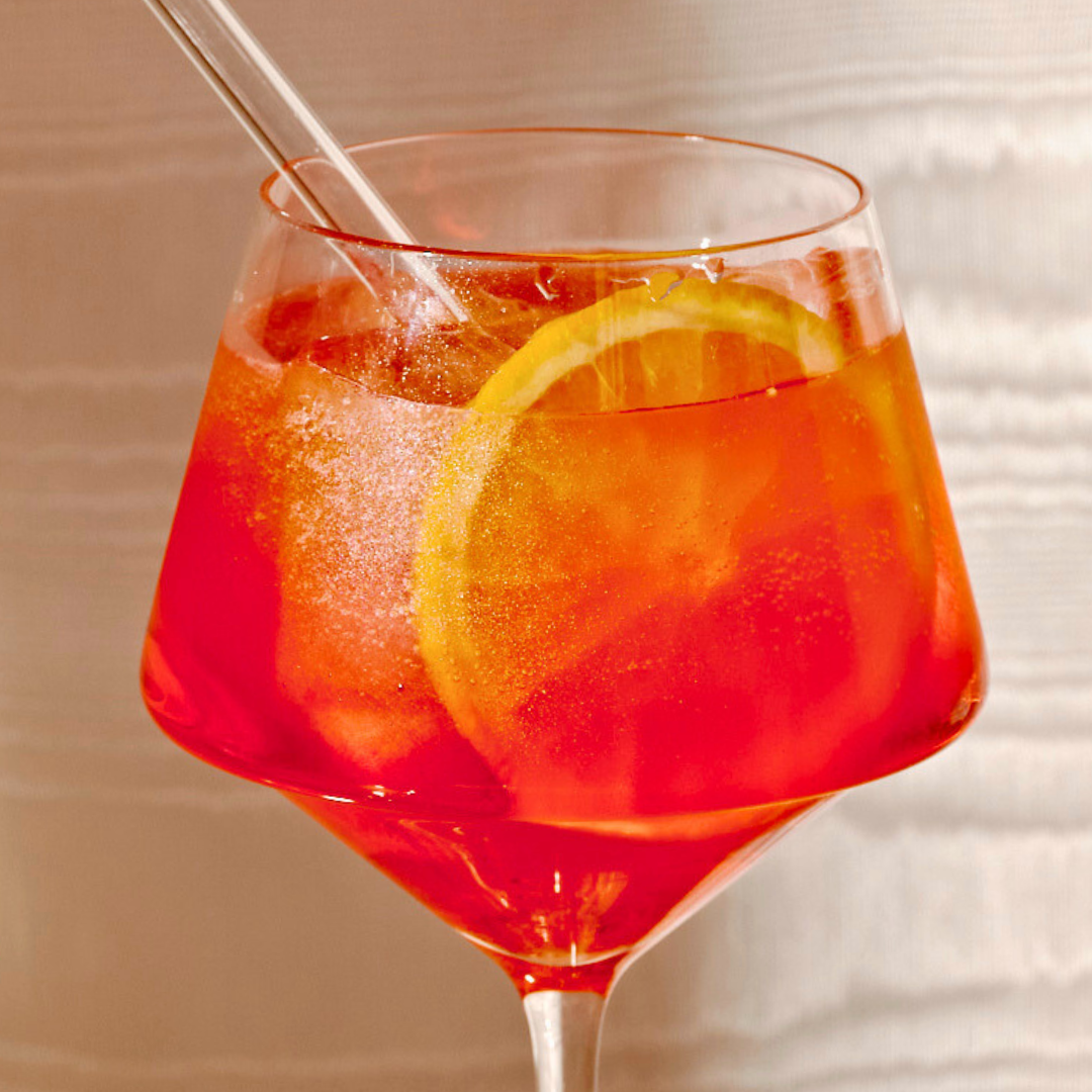 Herb-Infused Aperol Spritz with Citrus Rim
