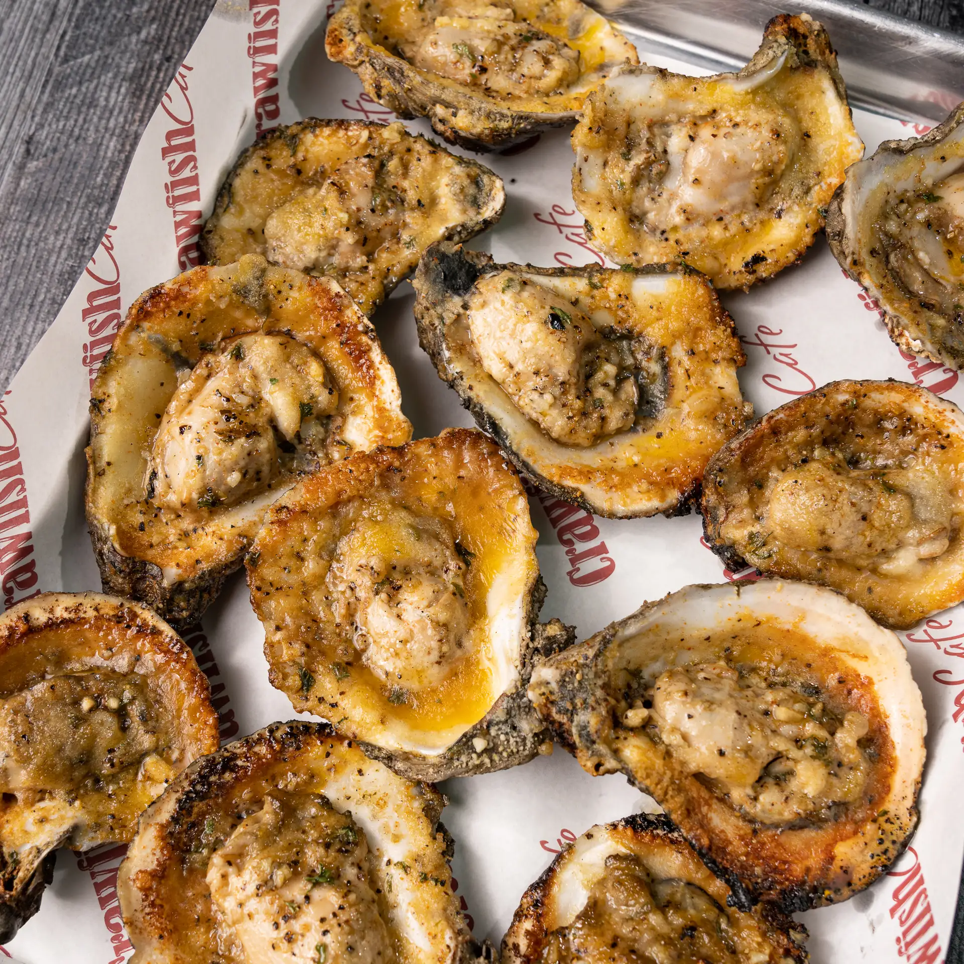 Char-Grilled Oysters with Smoked Butter & Citrus Gastrique