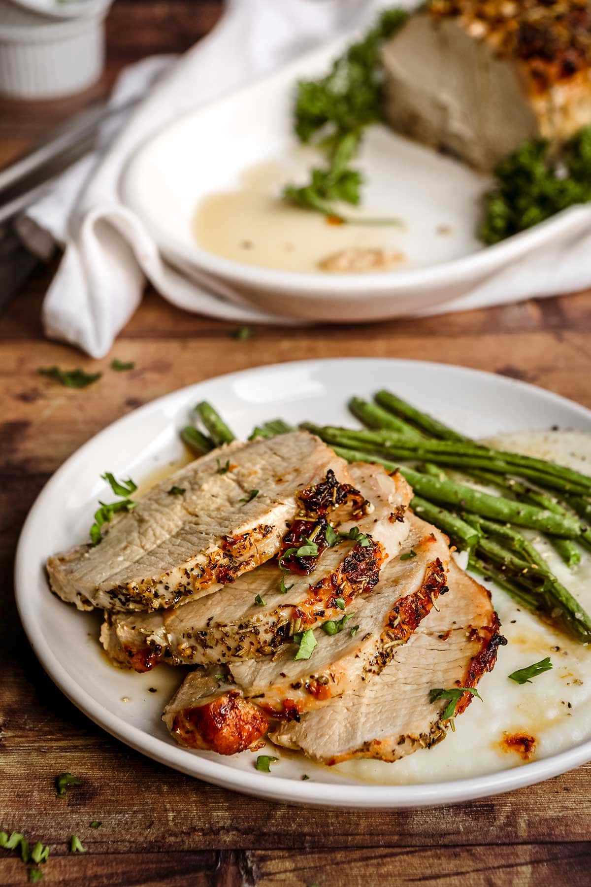 Herb-Crusted Pork Tenderloin with Lemon-Glazed Asparagus