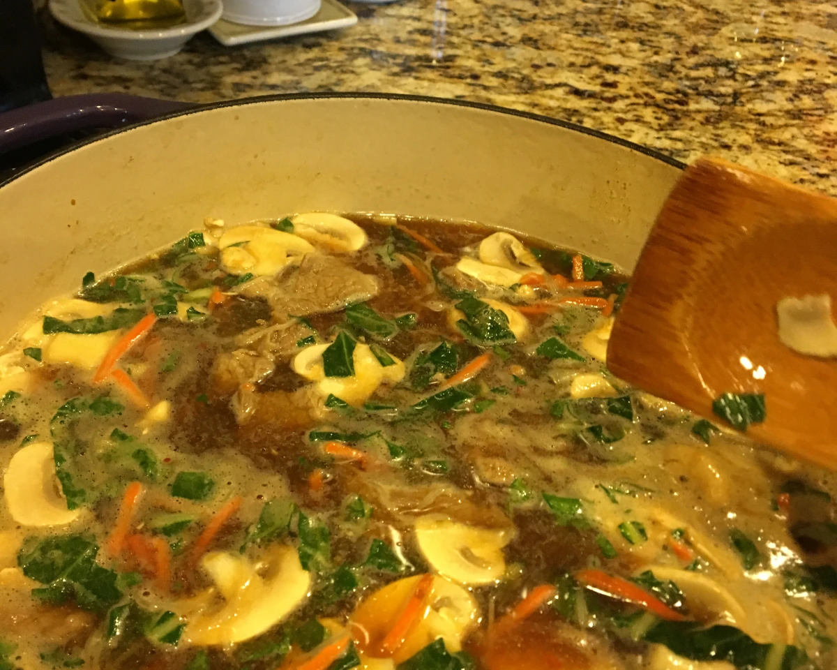 Beef Thenthuk Noodle Soup with Carrots and Peas