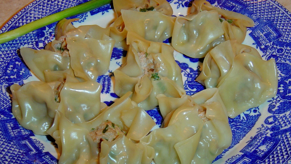 Steamed Pork Dumplings with Hidden Ginger and Garlic Filling