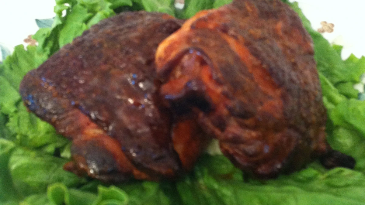 Herb-Crusted Smoked Chicken Thighs with Buttery Grits