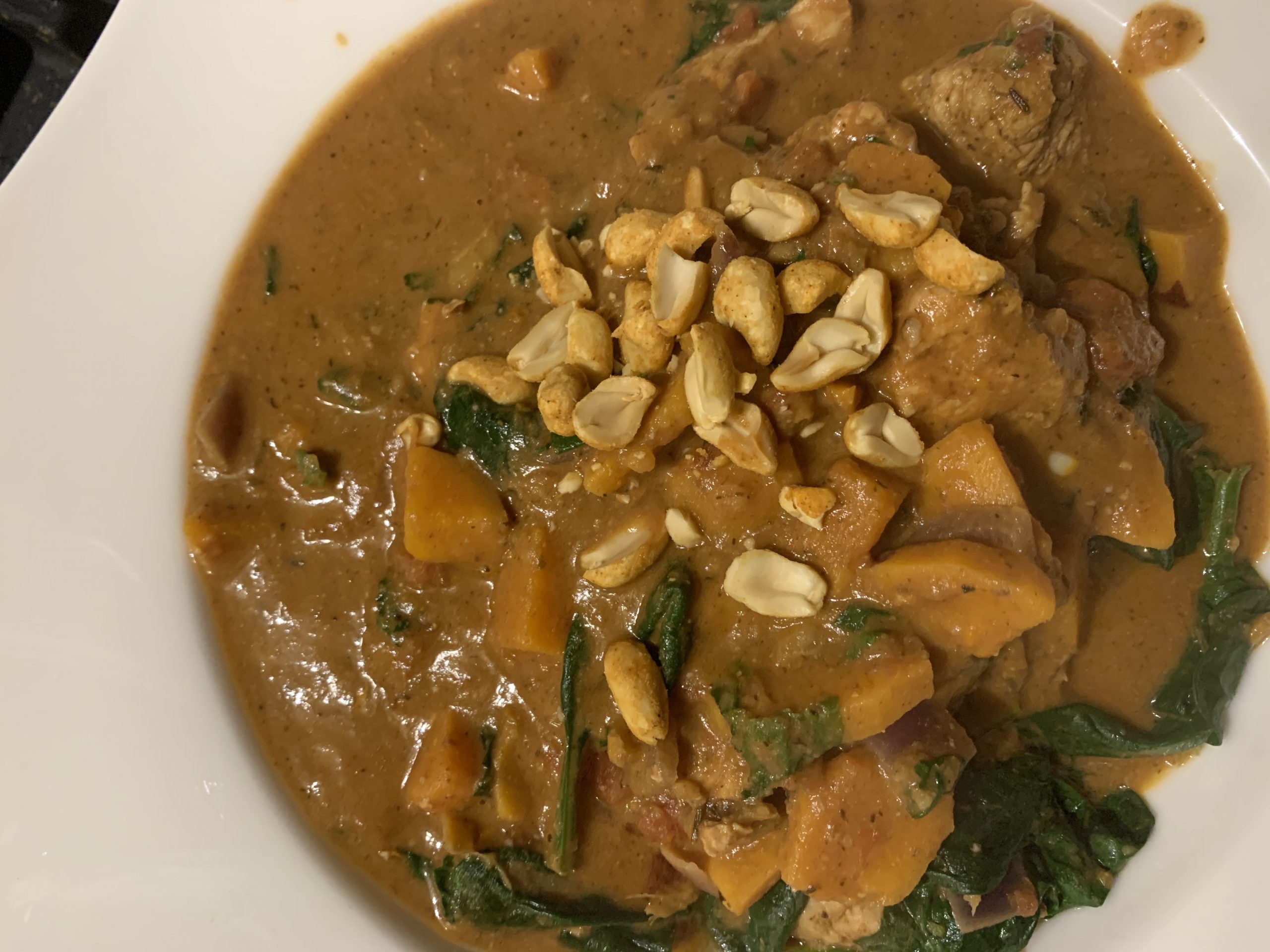 Smoky Peanut Chicken Stew with Leafy Greens