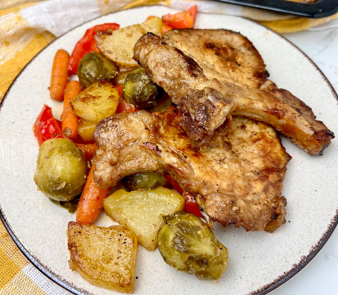 Savory Herb-Infused Pork Chops with Roasted Root Vegetables