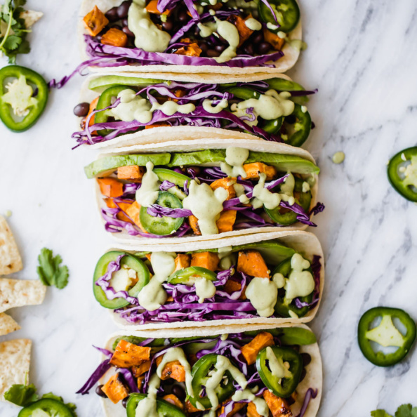 Cumin-Spiced Sweet Potato and Black Bean Tacos with Avocado Crema