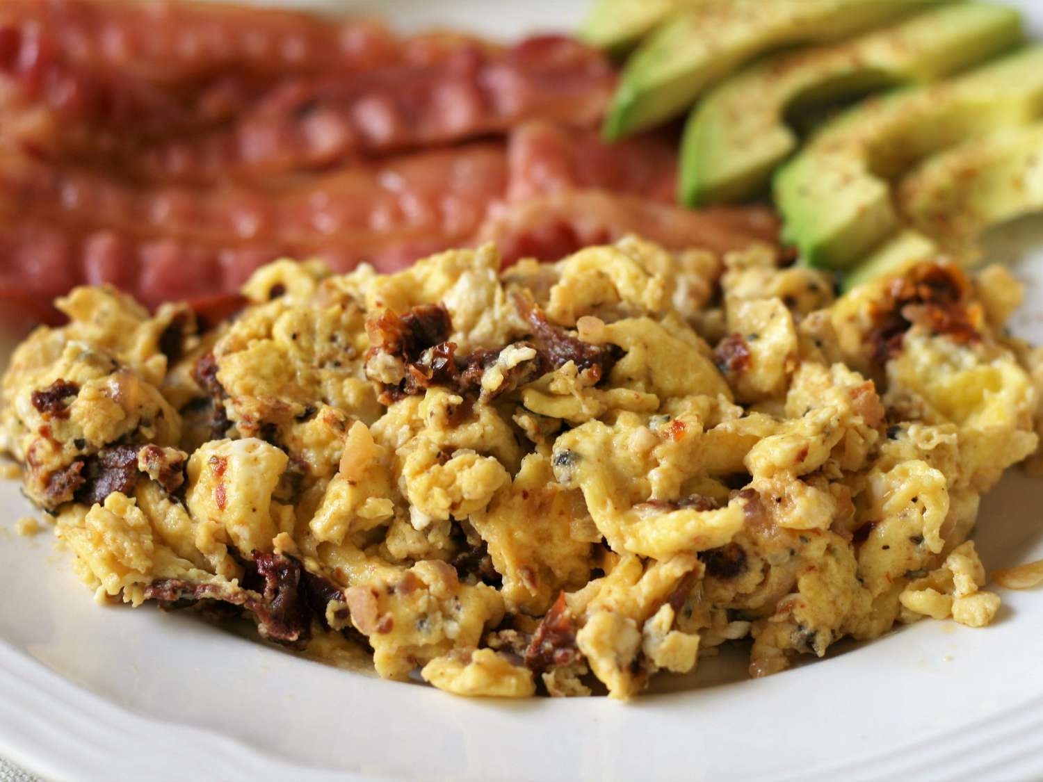 Herb-Scented Scrambled Eggs with Sun-Dried Tomatoes