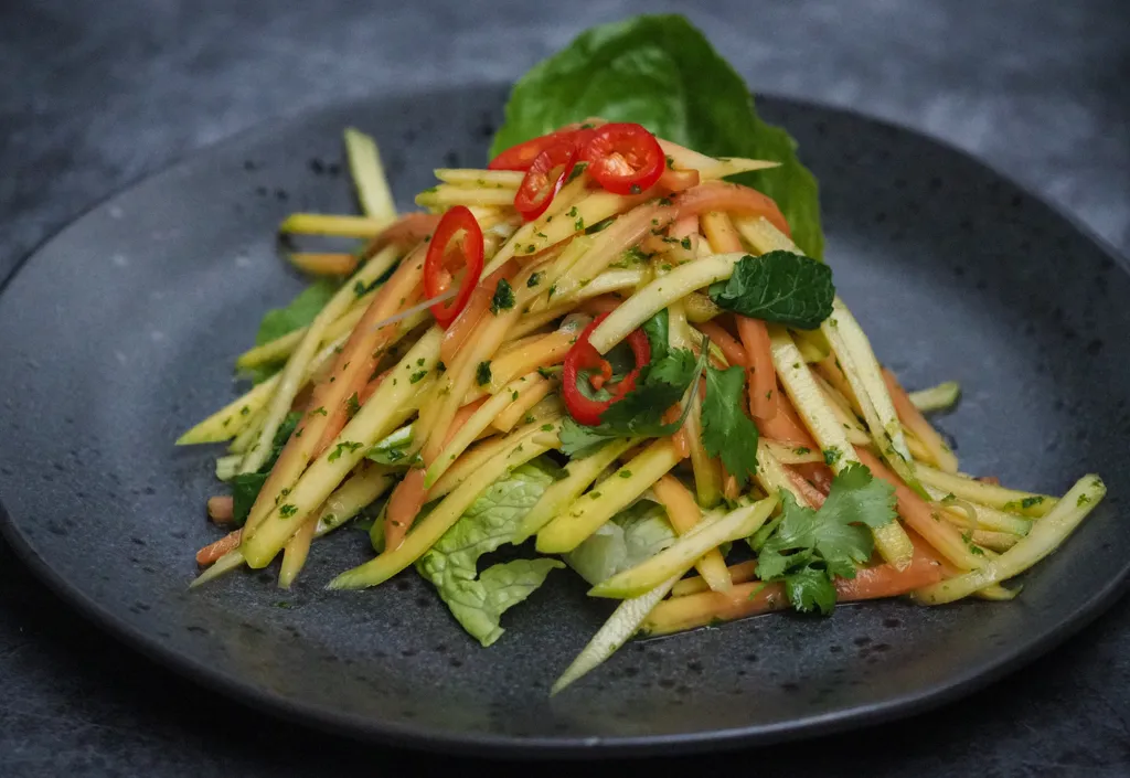 Vibrant Mango and Papaya Salad with Lime Vinaigrette