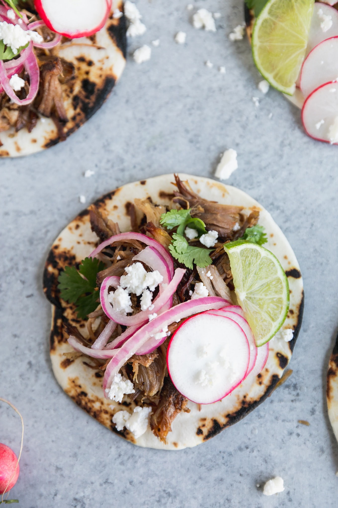 Slow-Cooked Pork Carnitas Tacos with Pickled Onions