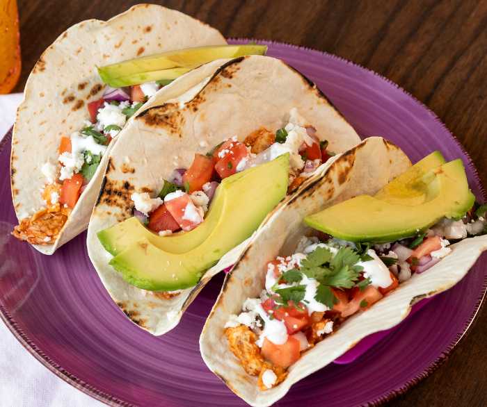 Chipotle-Lime Crema Chicken Tacos with Avocado Slaw