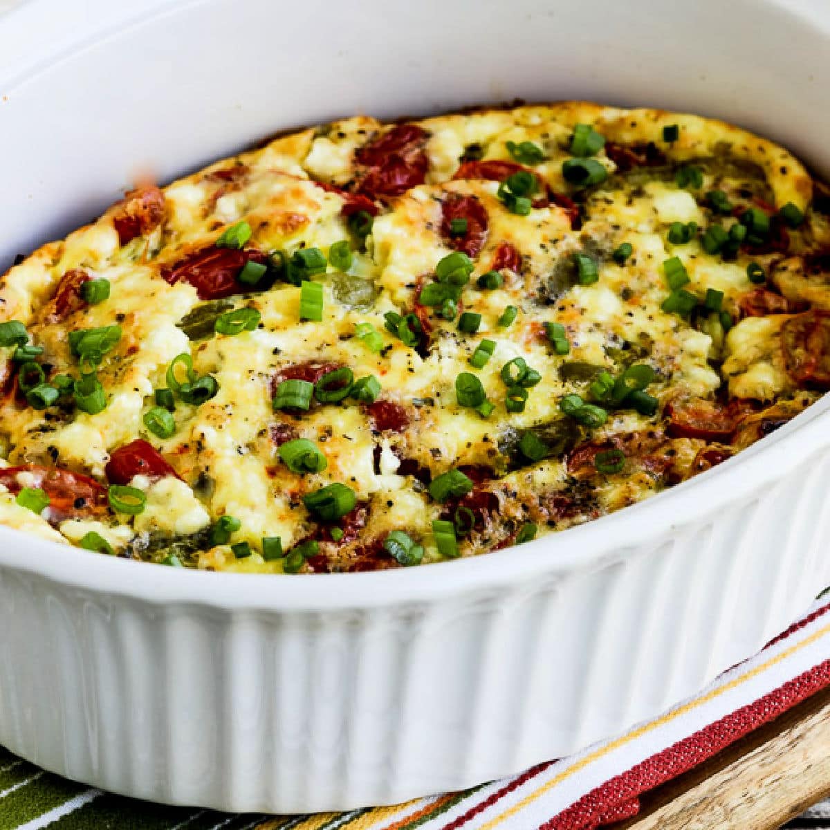 Savory Herb-Crusted Egg Bake with Roasted Tomatoes