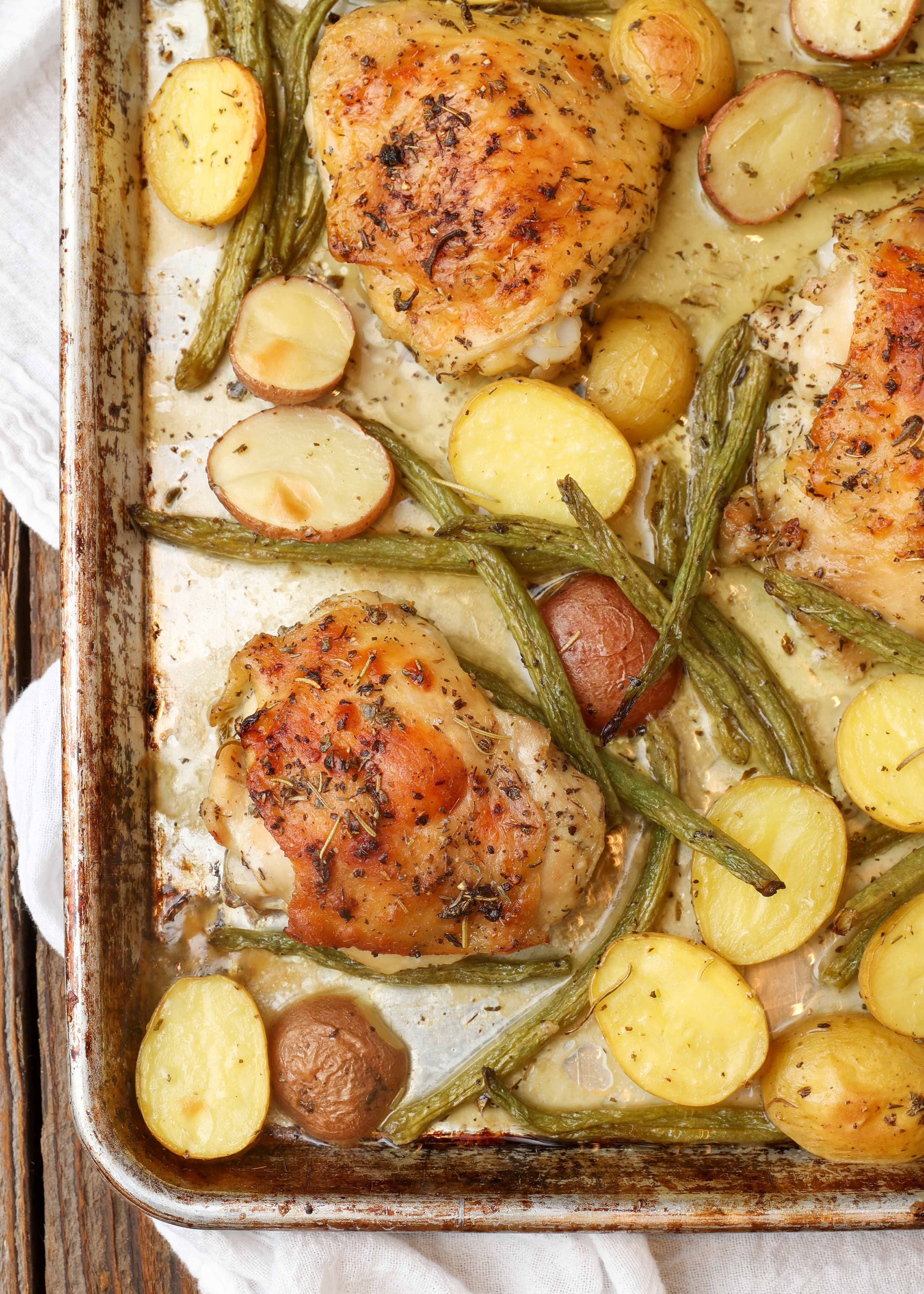 Sheet Pan Herb-Roasted Chicken Thighs with Potatoes and Carrots