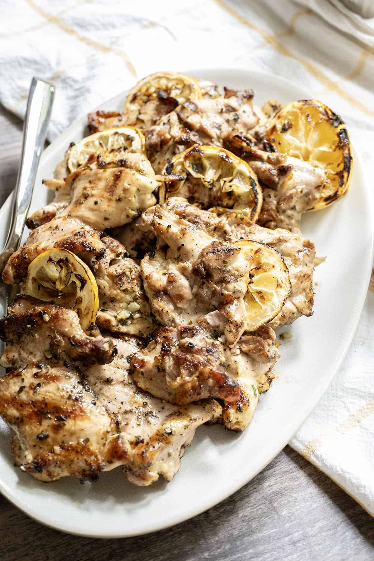 Lemon-Pepper Grilled Chicken Thighs with Herb Butter