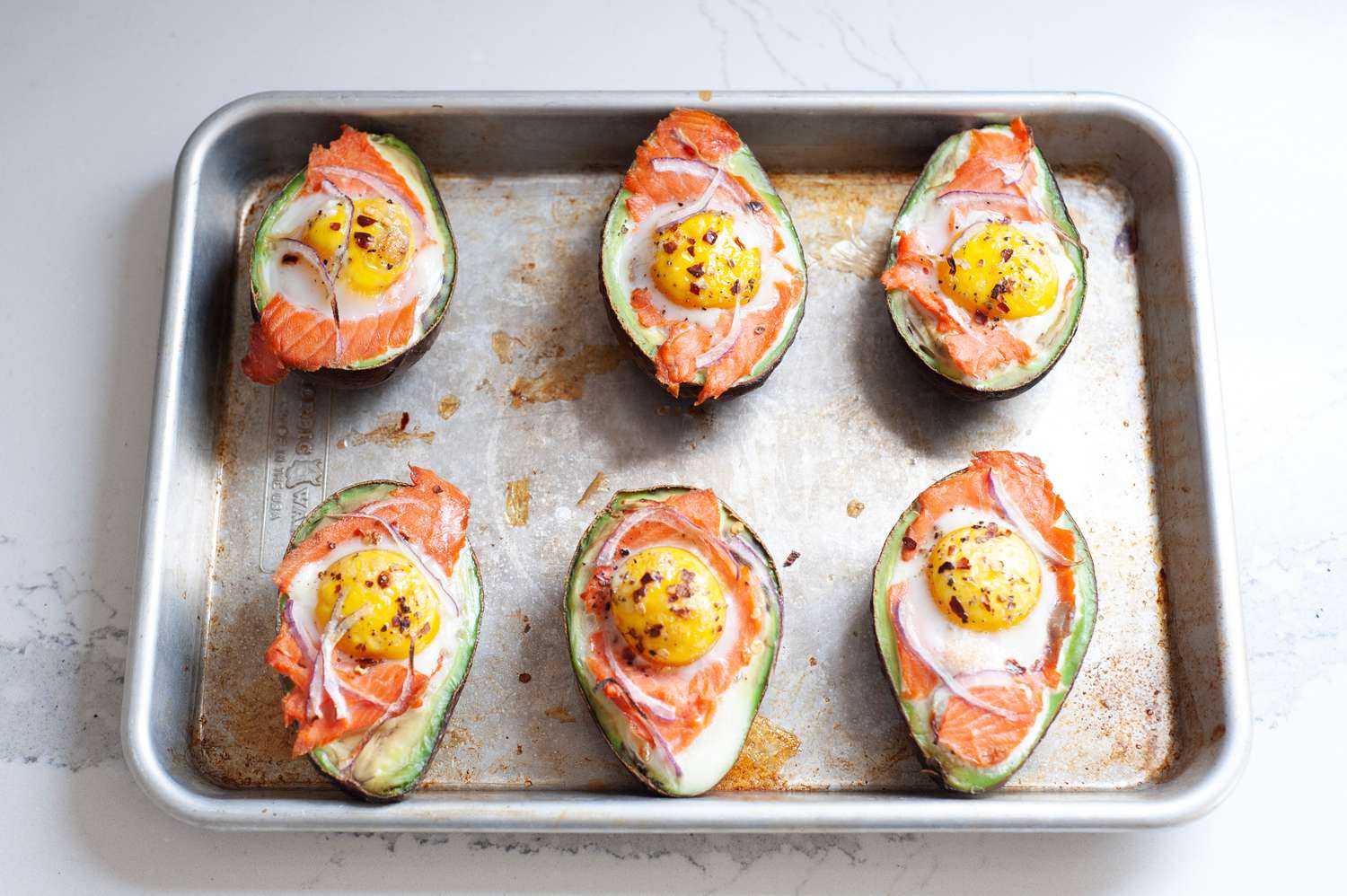 Avocado-Baked Eggs with Smoked Salmon and Feta