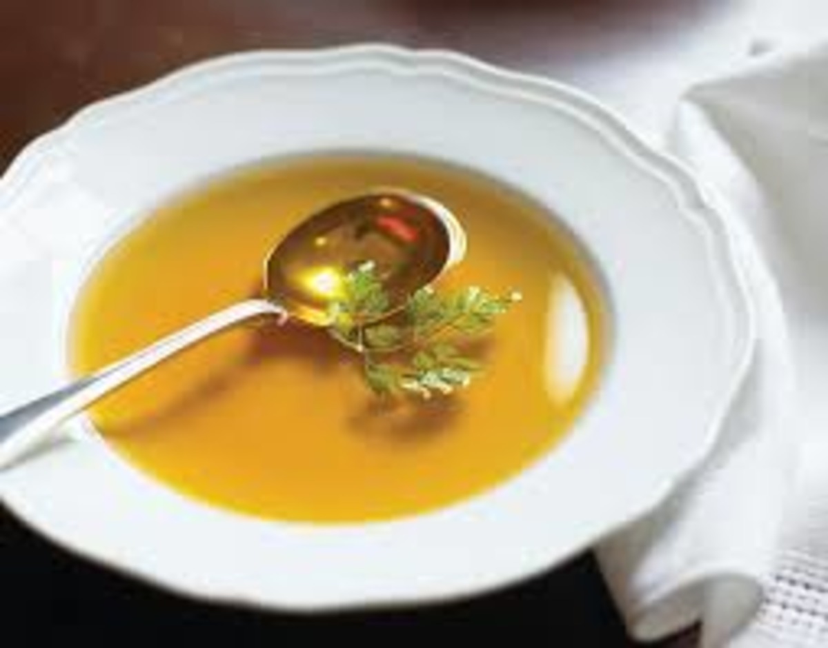 Clear Beef Consommé with Single Asparagus Silhouette
