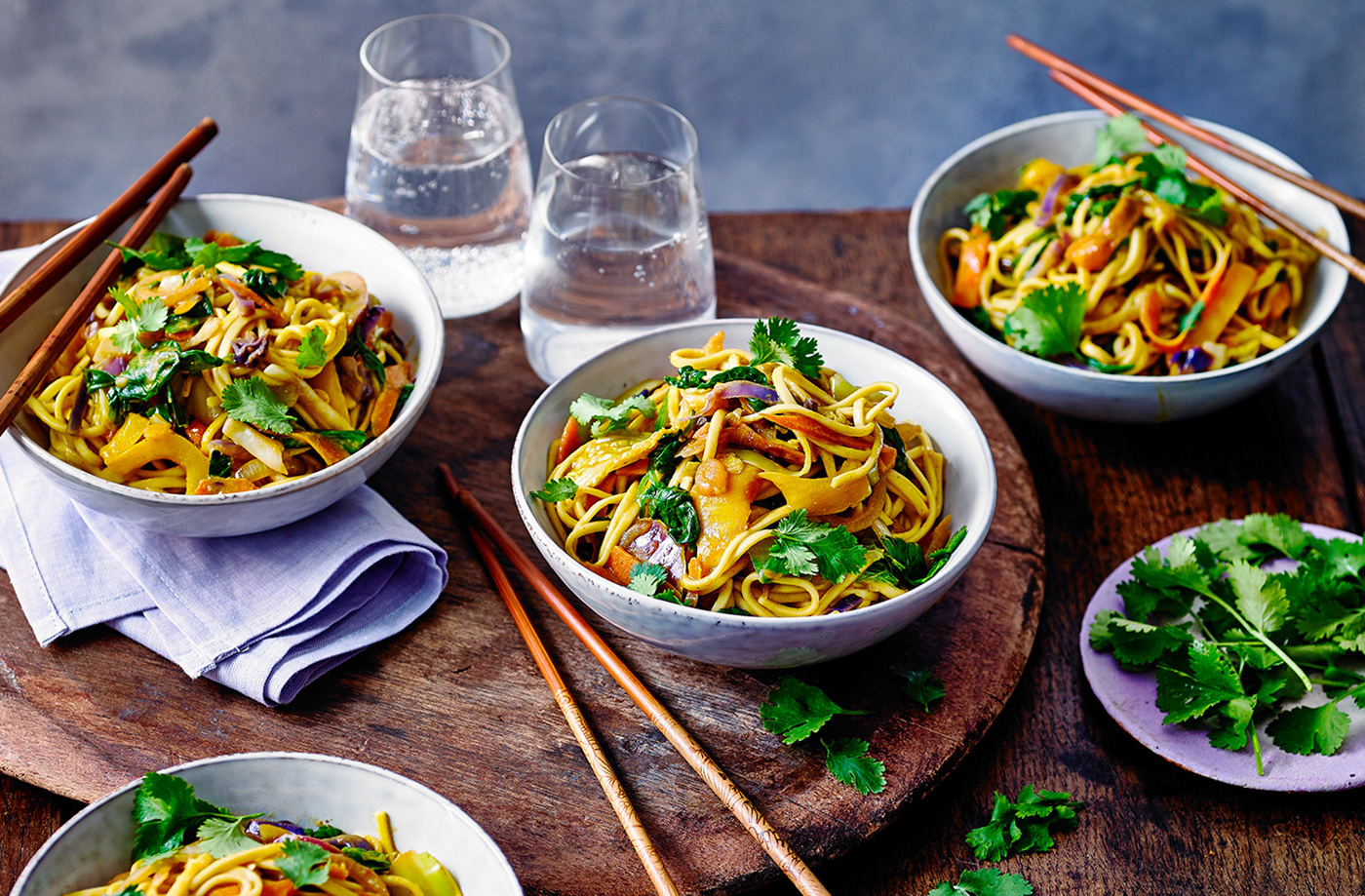 Asian-Inspired Stir-Fried Noodles with Mediterranean Hummus and Spinach