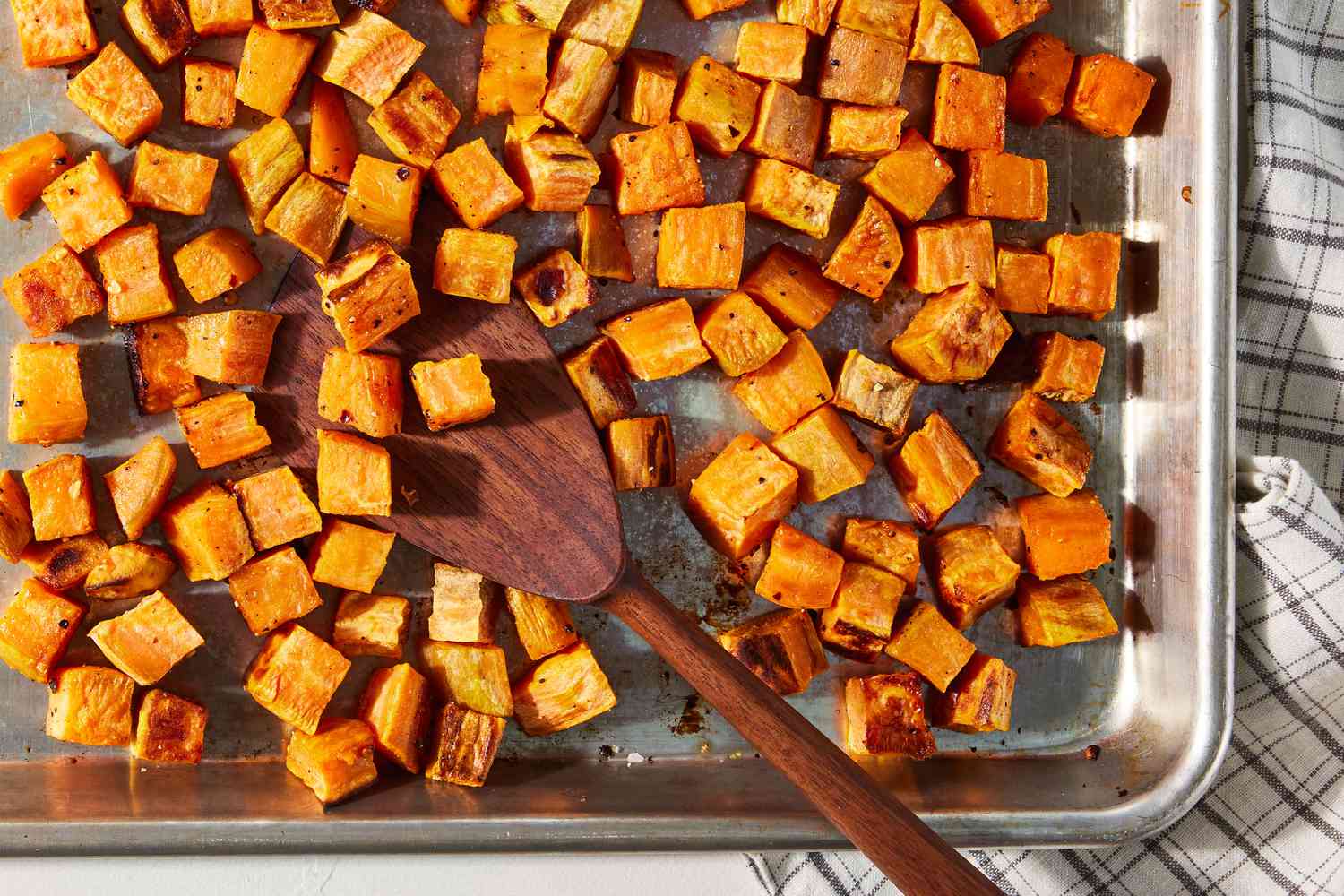 Sheet-Pan Roasted Sweet Potatoes with Kale and Pumpkin Seeds