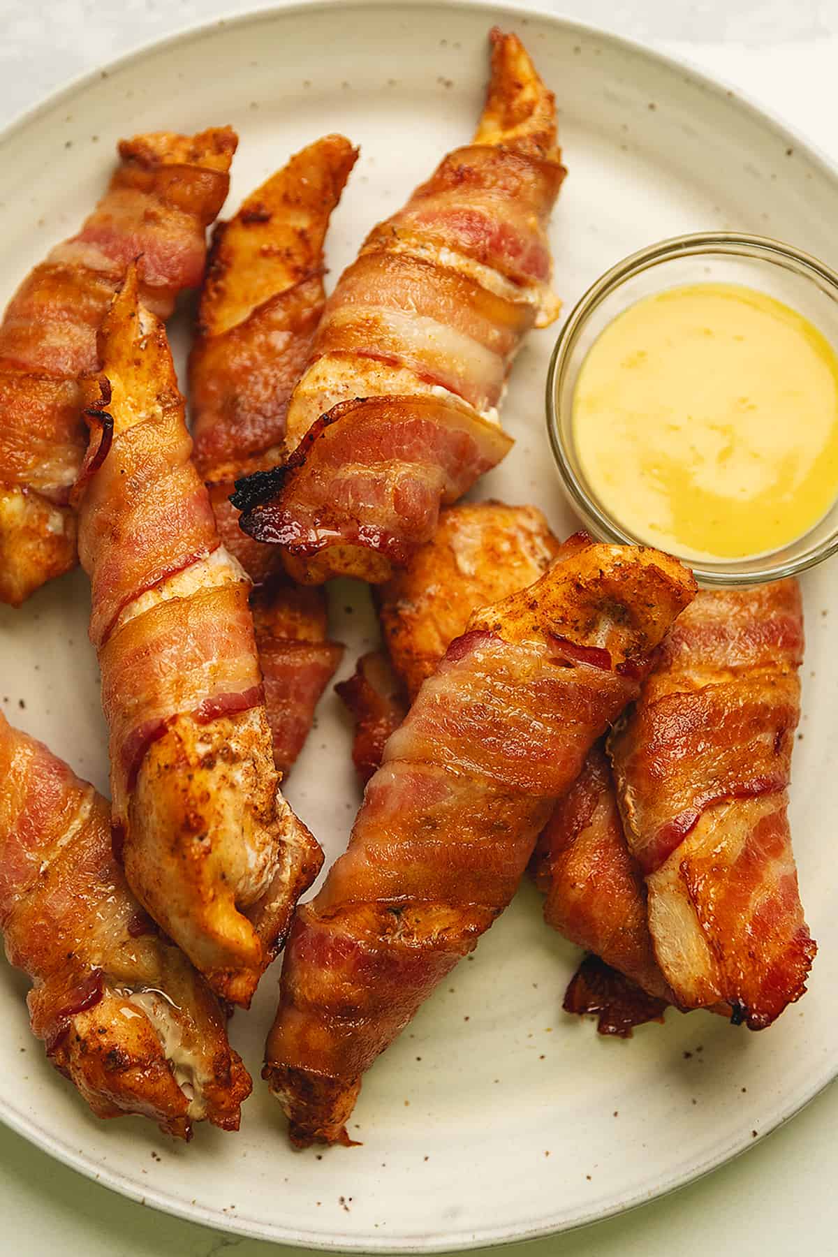 Bacon-Wrapped Chicken Tenders with Garlic Butter